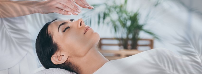 A woman resting calmly during a Reiki session in Newport, Shropshire
